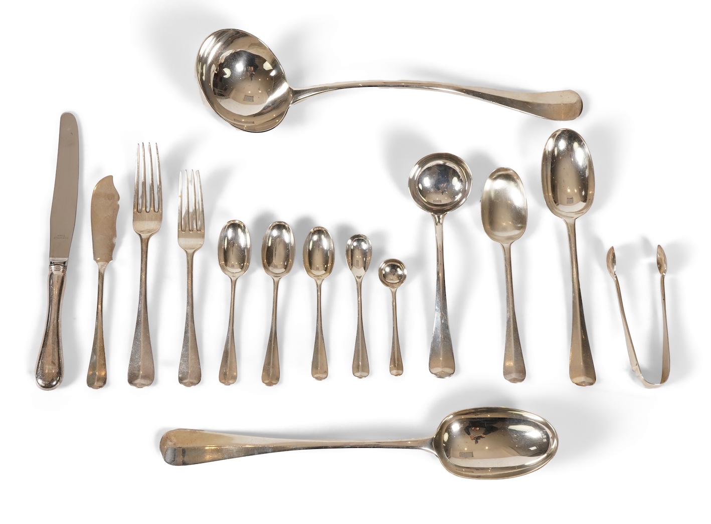 A George V canteen of silver Hanoverian rat tail flatware, by Mappin & Webb